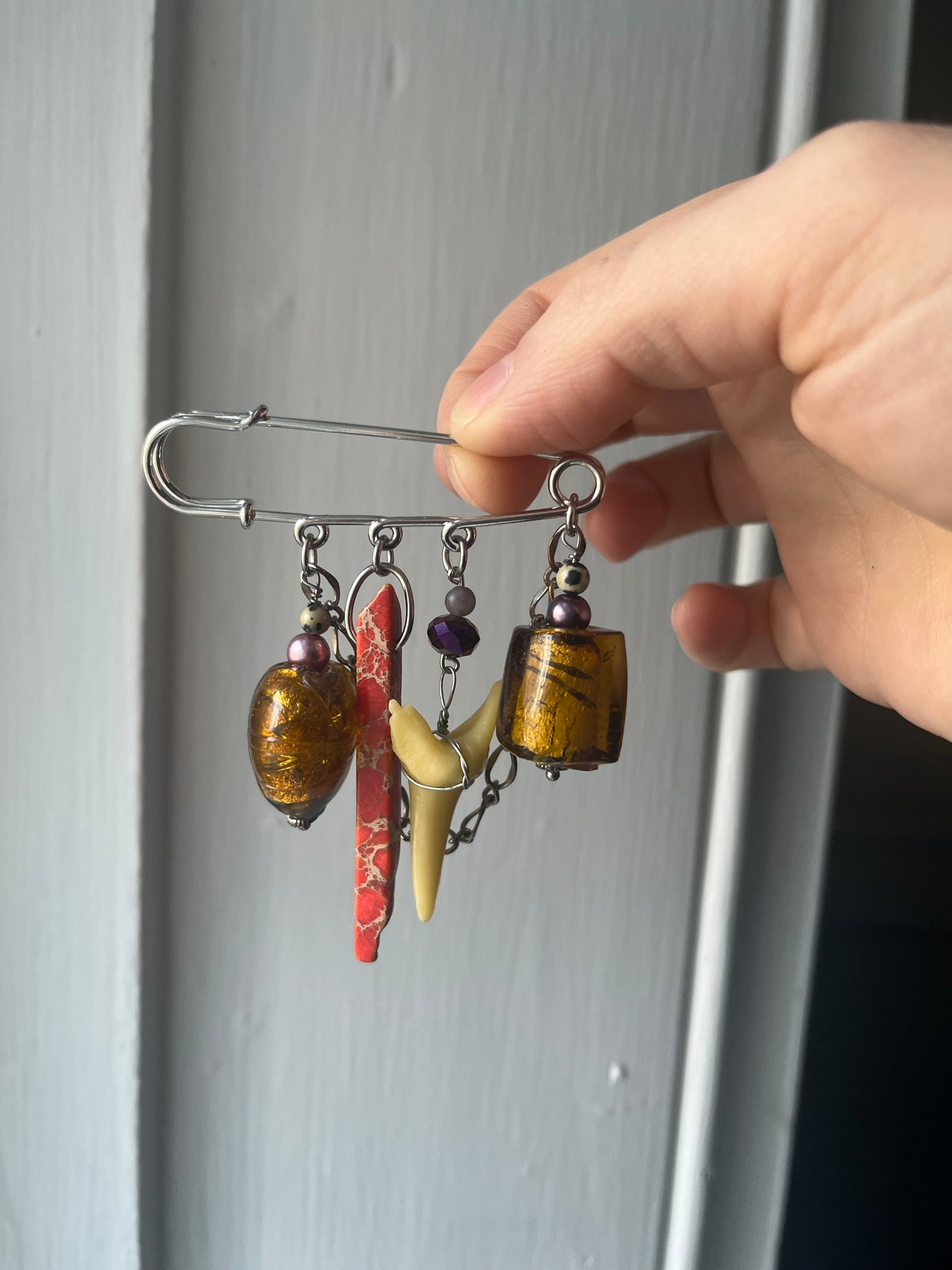 Shark tooth charm pin