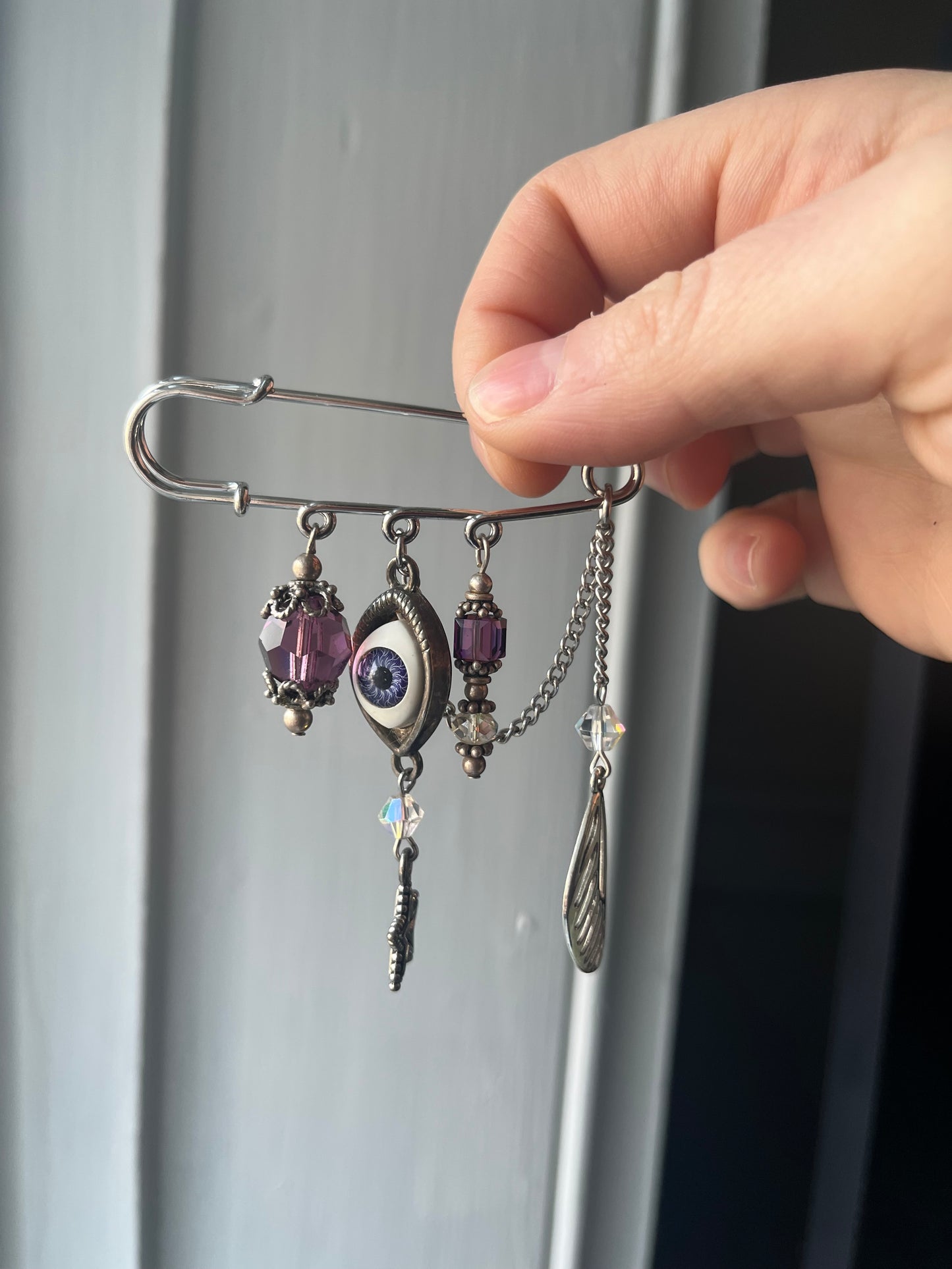 Purple eye charm pin