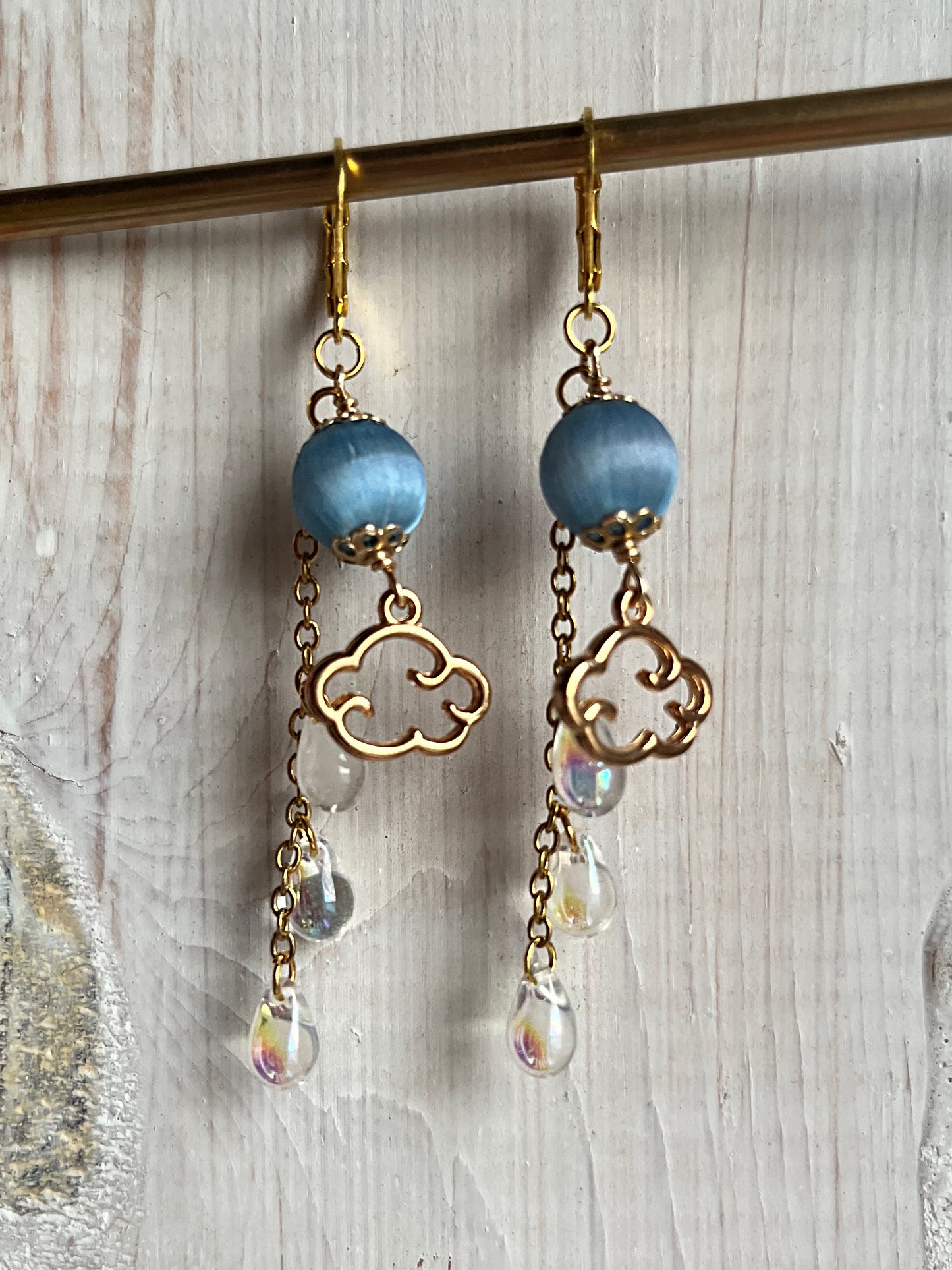 Gold rain cloud dangles