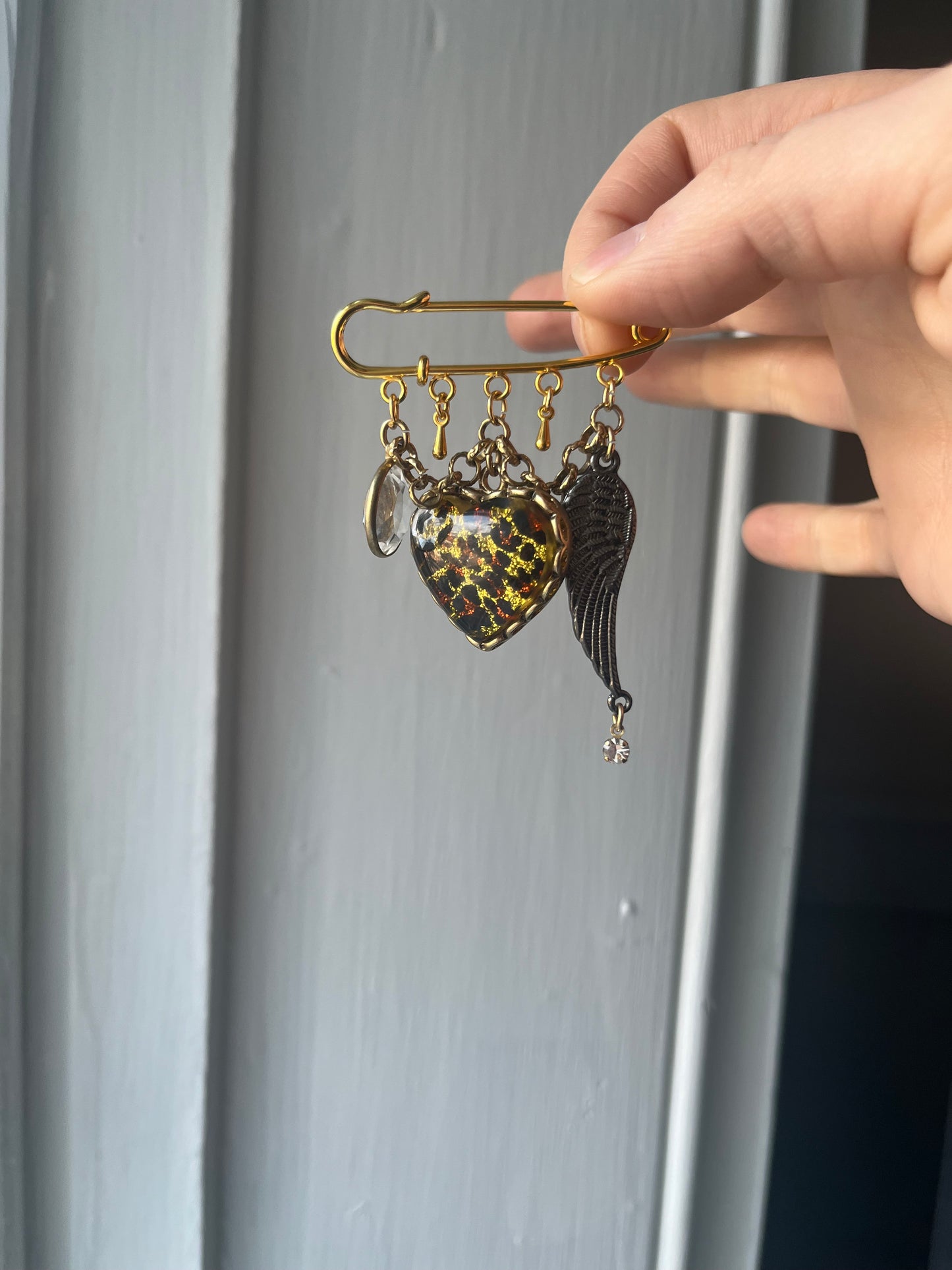 Primal heart charm pin