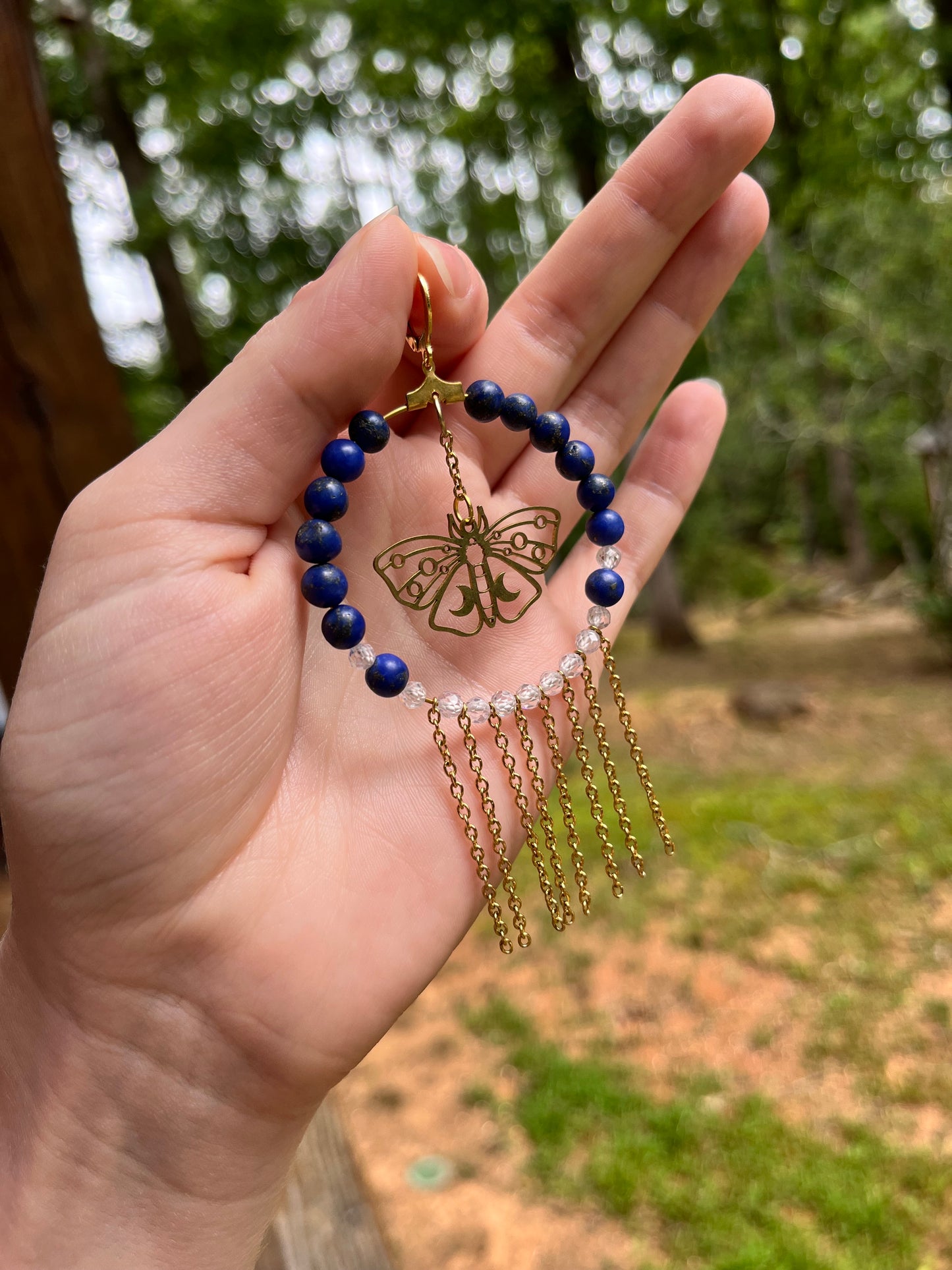 Gold moth earrings