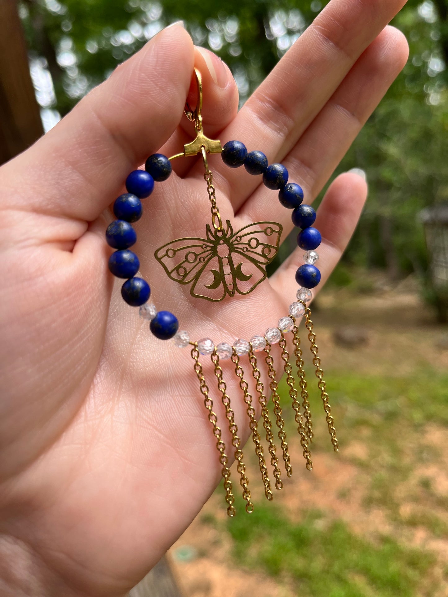 Gold moth earrings