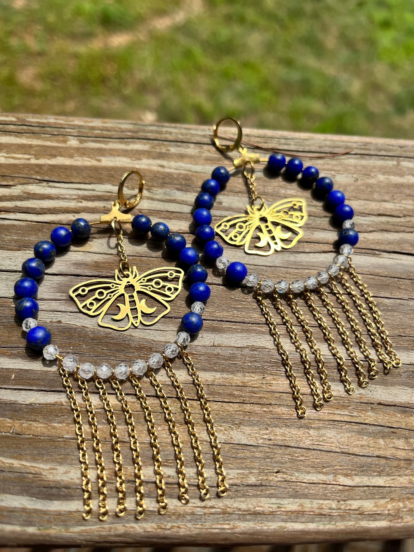 Gold moth earrings