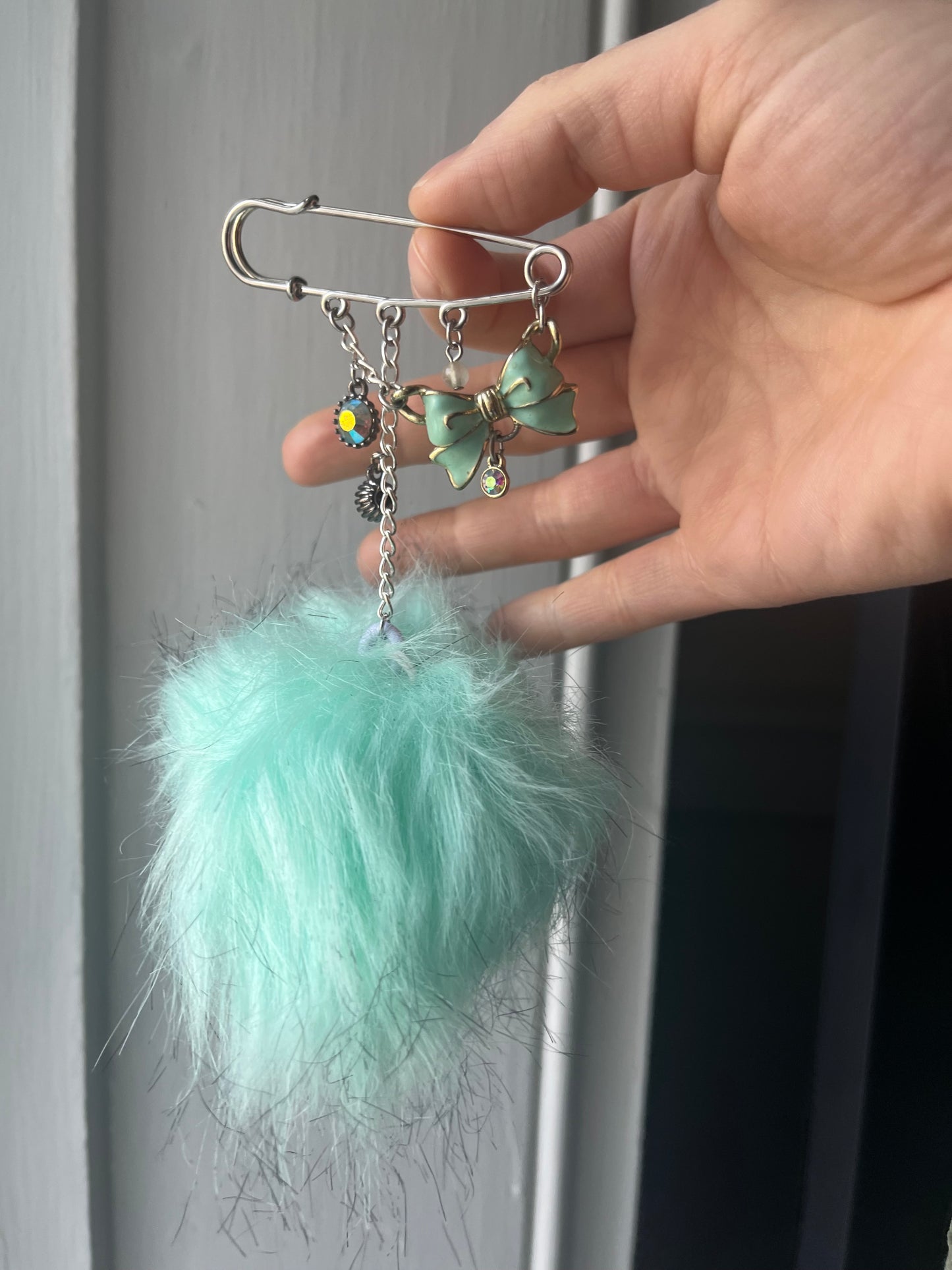 Teal charm pin